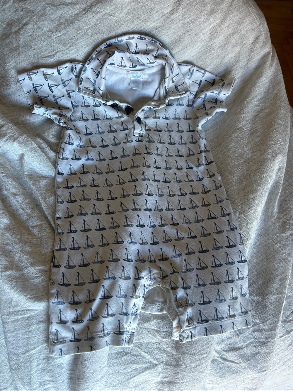 Featherbaby White One-Piece with Navy Sailboat Print